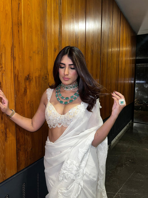 Anisha in Lady Coco Bridgerton, lace and pearls.