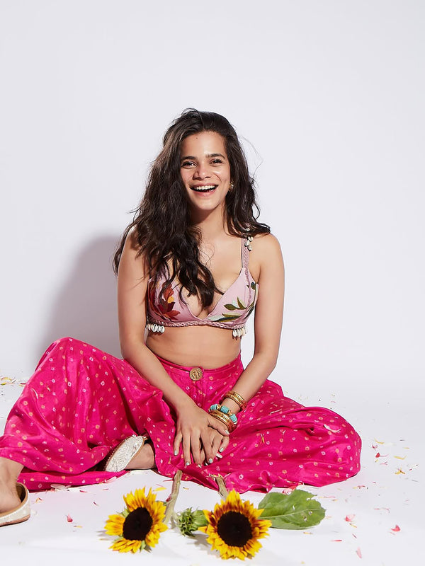 SRISHTI IN PINK BANDHNI TROUSERS, LILACS AND SEA SHELLS