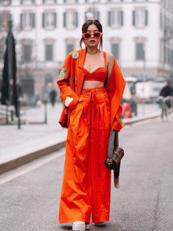 RIYA IN ORANGE IS AN ISLAND TROUSER SET